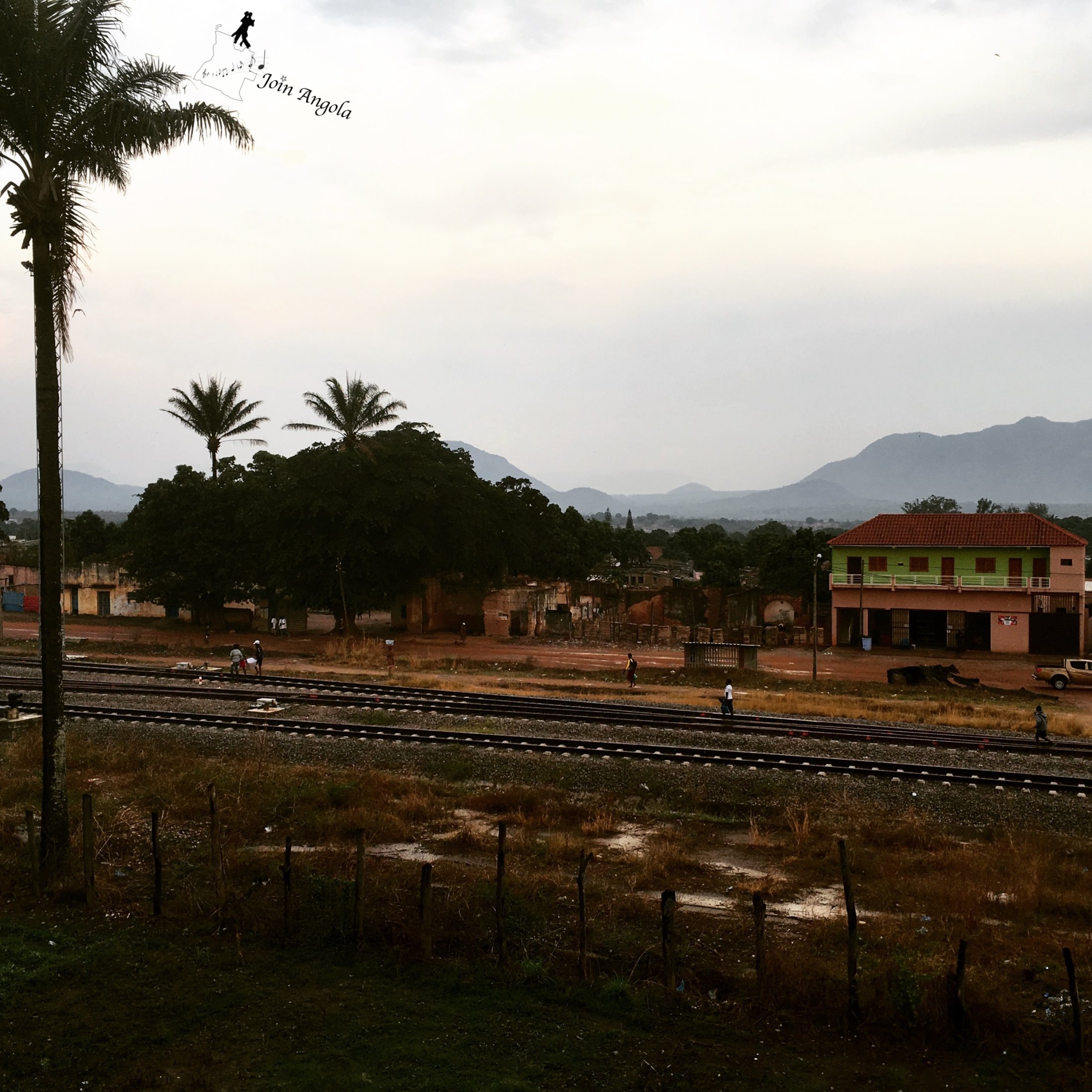 A rainy view of Ganda, another city in the Province of Benguela. A train passes on those railways once or twice a day.